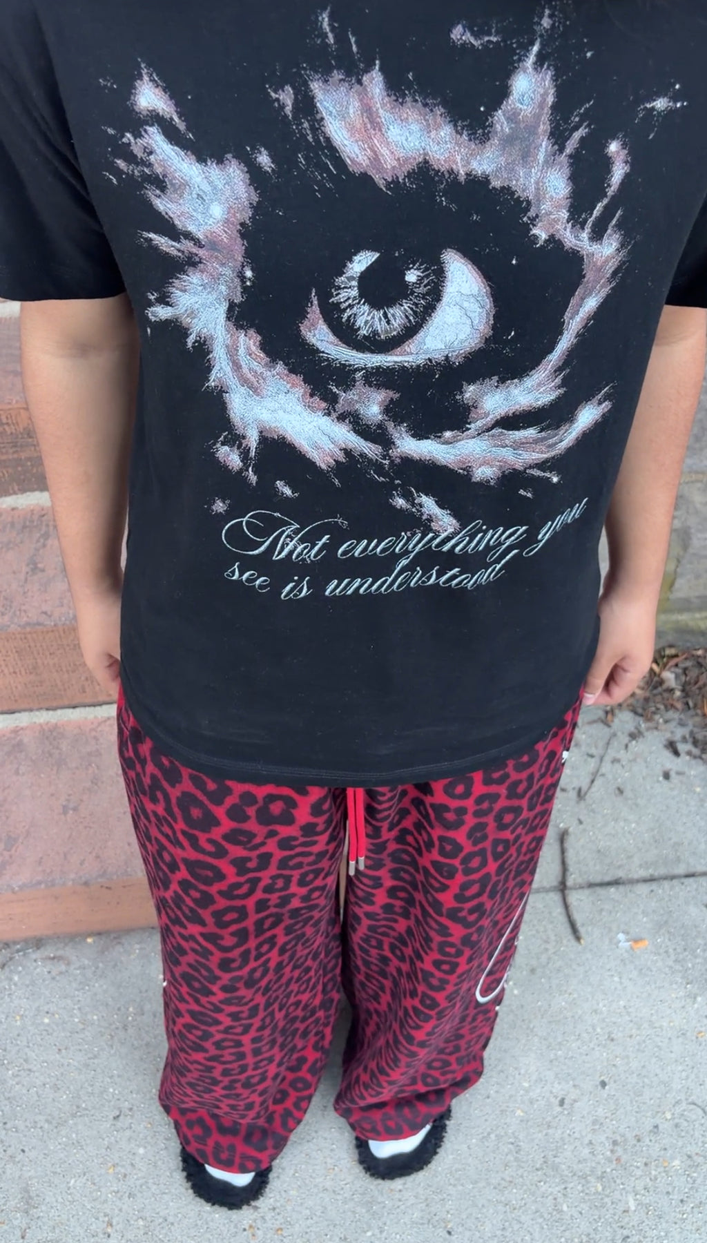 "deceptive sight" black tee