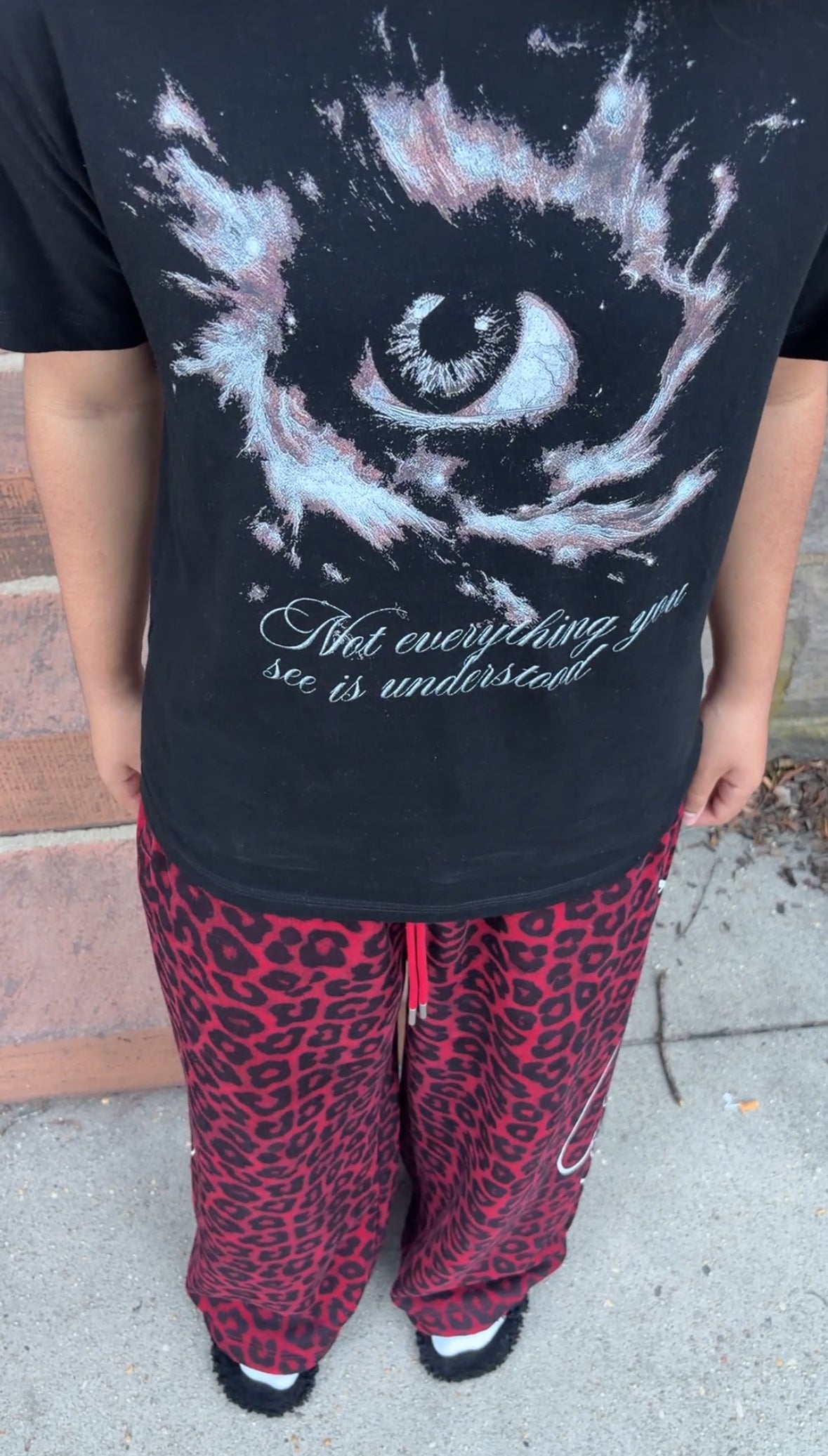 "deceptive sight" black tee